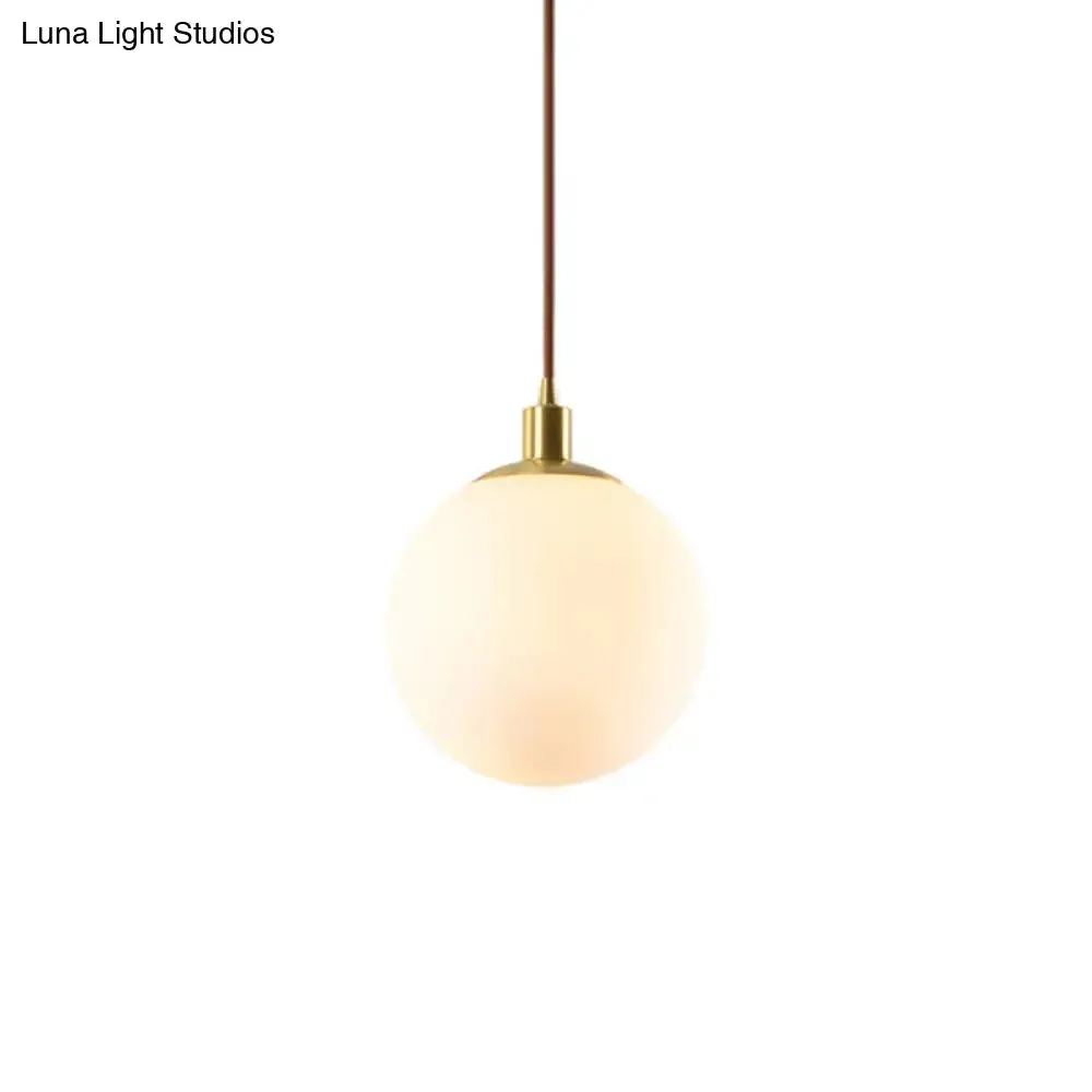 Contemporary Glass Pendant Light – Gold Spherical Design for Bedroom