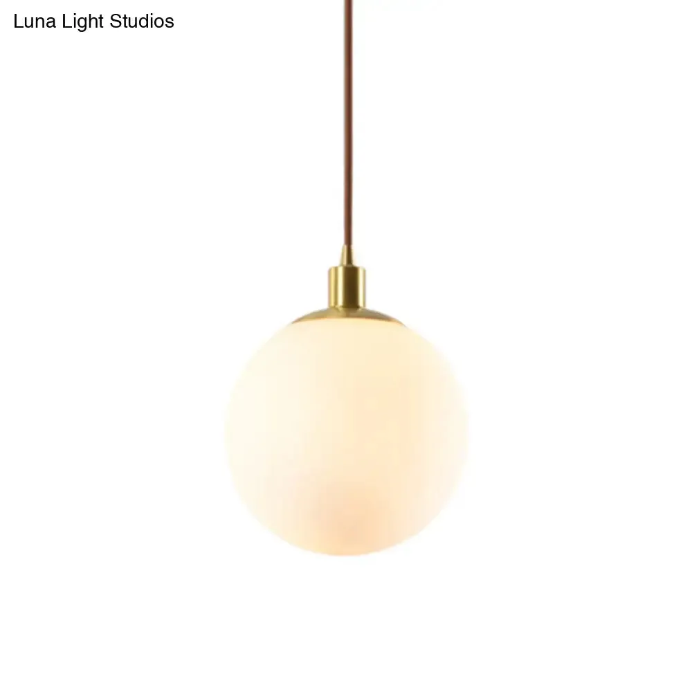 Contemporary Glass Pendant Light – Gold Spherical Design for Bedroom