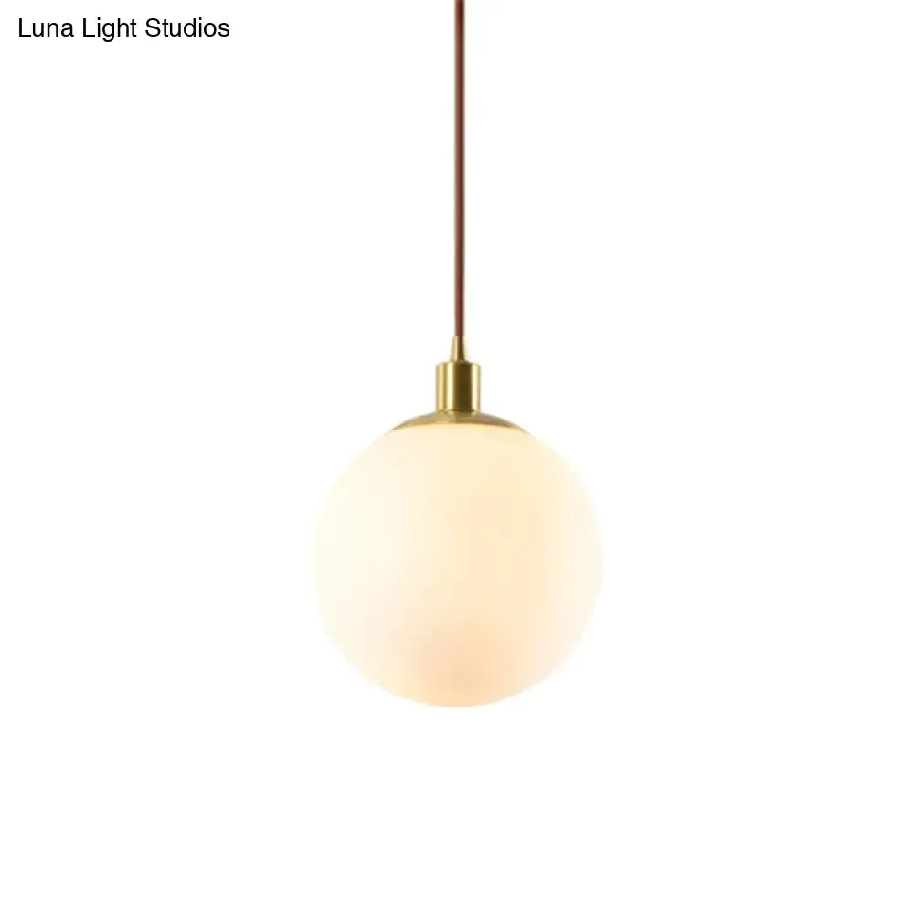 Contemporary Glass Pendant Light – Gold Spherical Design for Bedroom