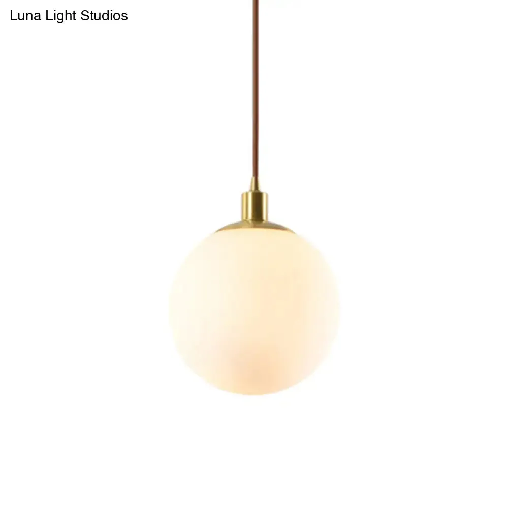 Contemporary Glass Pendant Light – Gold Spherical Design for Bedroom