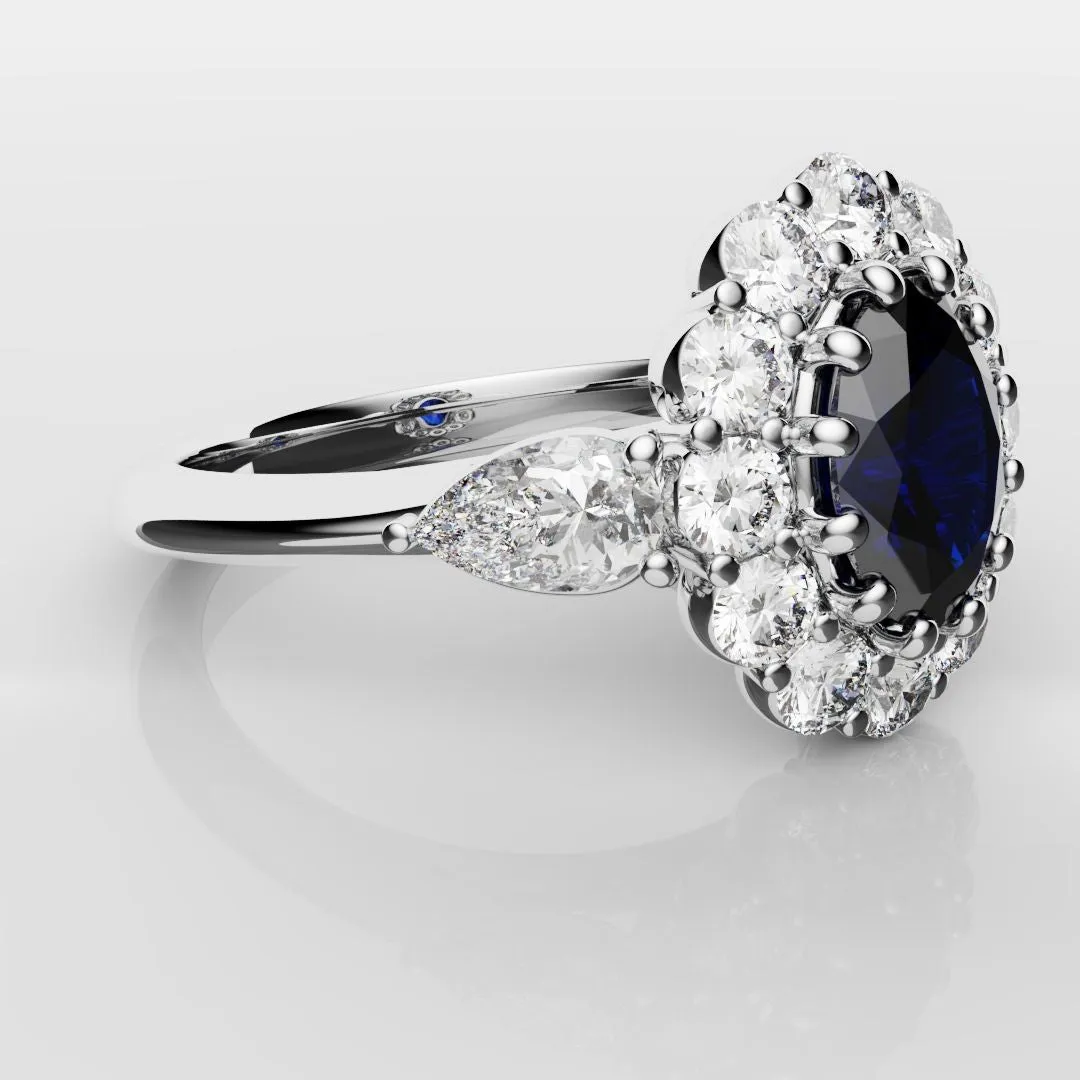 Oval Sapphire Cluster With Pear Shoulder Diamonds