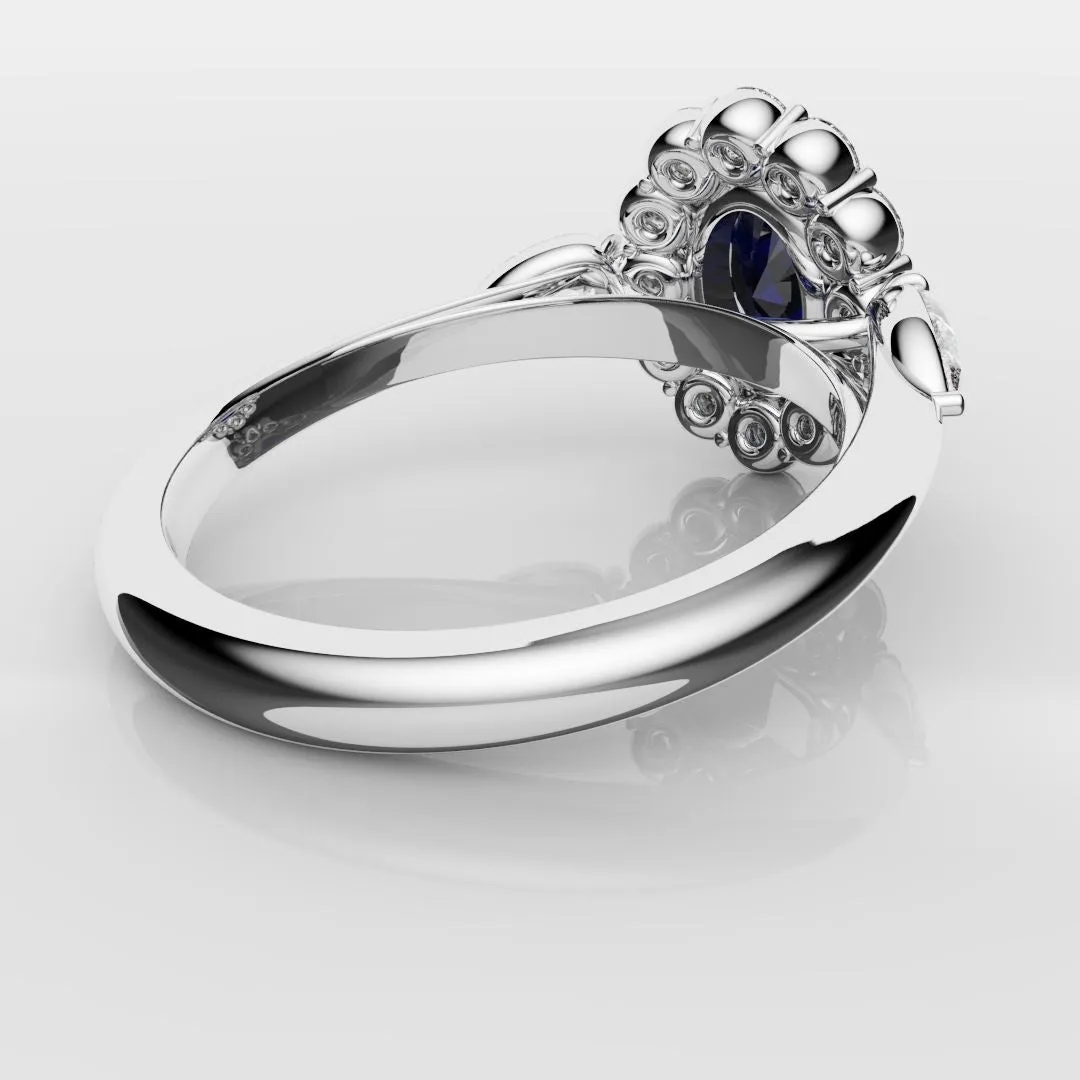 Oval Sapphire Cluster With Pear Shoulder Diamonds