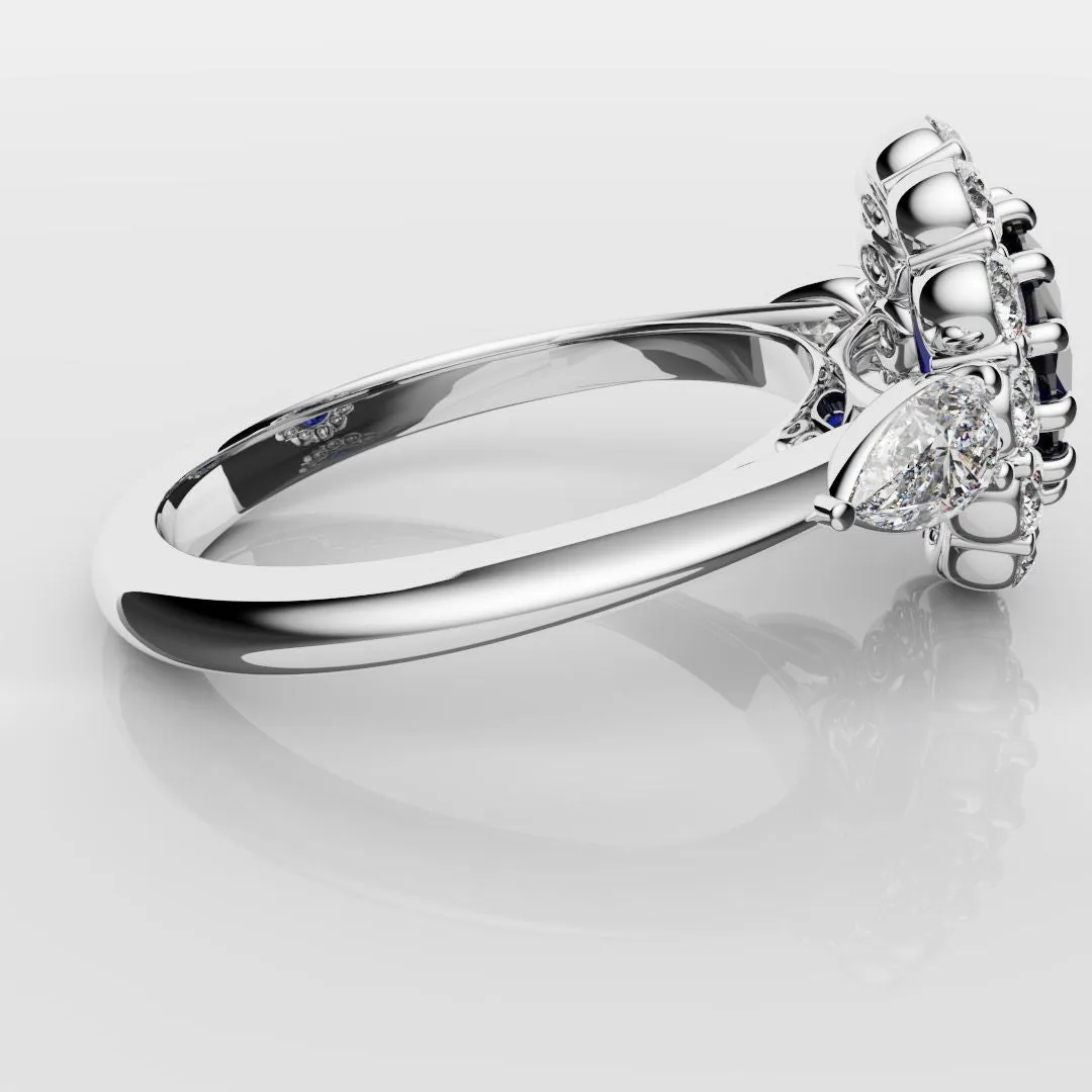 Oval Sapphire Cluster With Pear Shoulder Diamonds