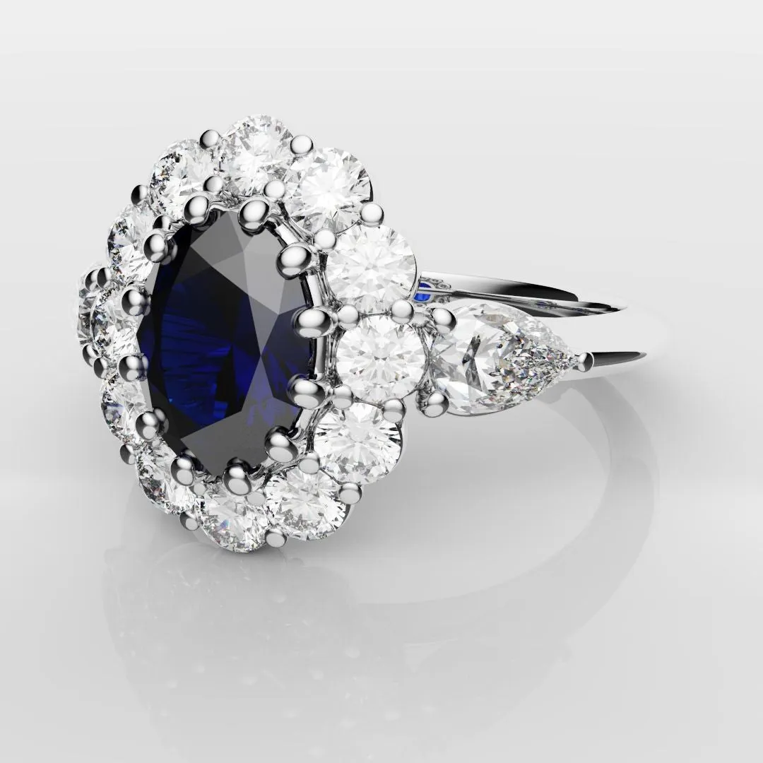 Oval Sapphire Cluster With Pear Shoulder Diamonds