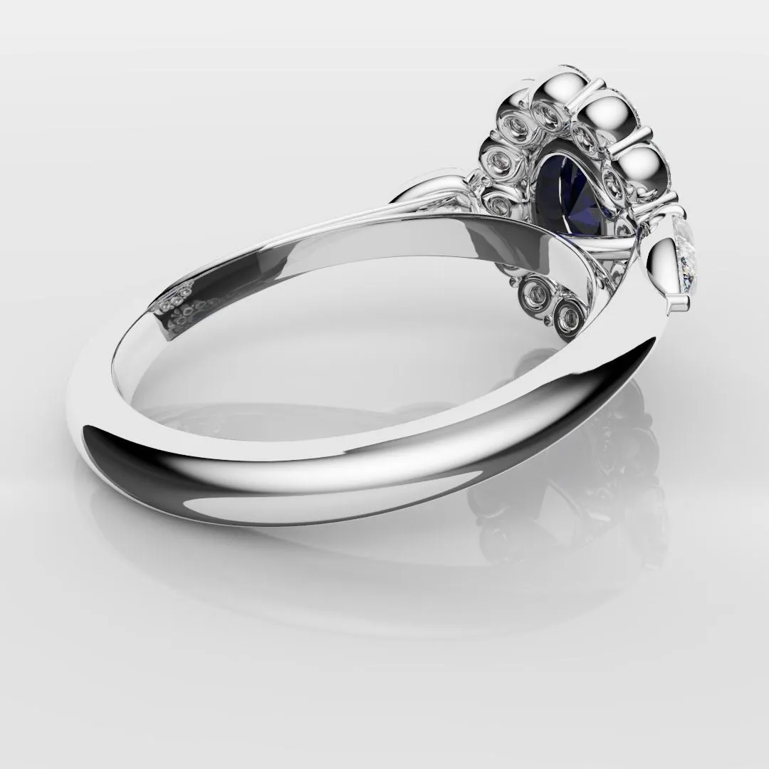 Oval Sapphire Cluster With Pear Shoulder Diamonds