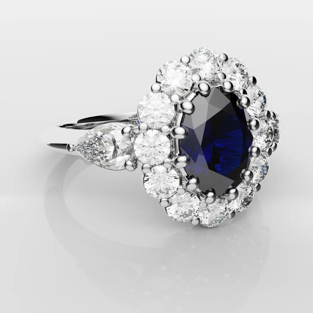 Oval Sapphire Cluster With Pear Shoulder Diamonds