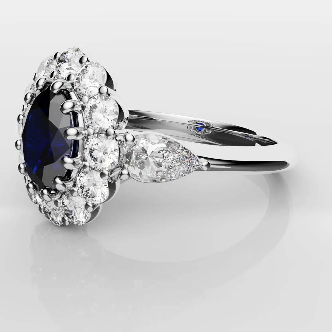 Oval Sapphire Cluster With Pear Shoulder Diamonds