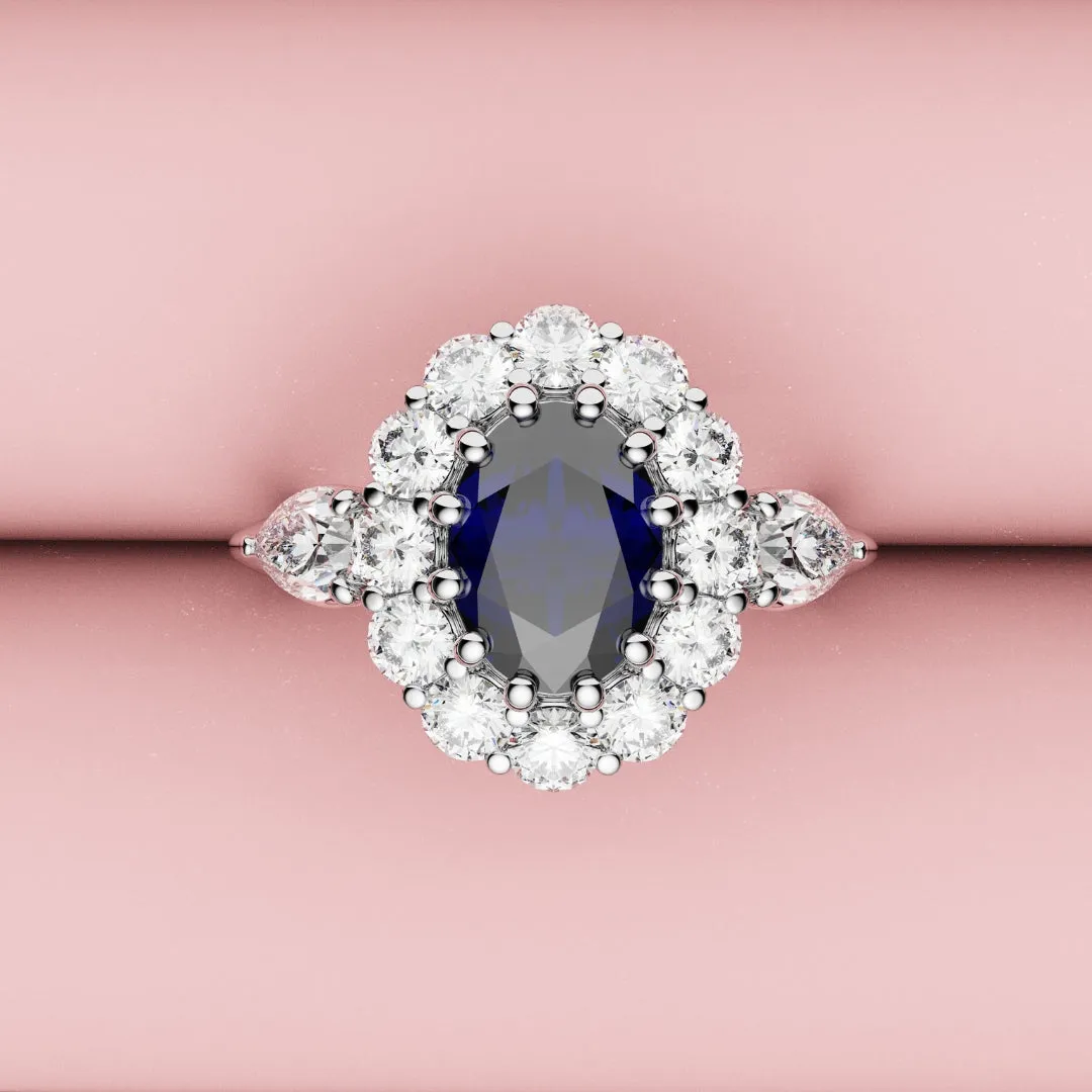 Oval Sapphire Cluster With Pear Shoulder Diamonds