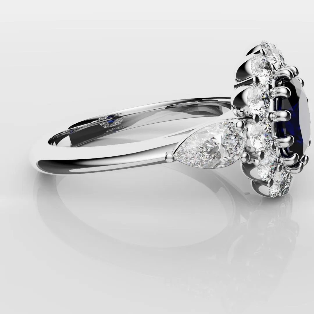 Oval Sapphire Cluster With Pear Shoulder Diamonds