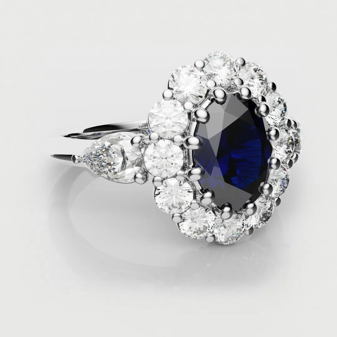 Oval Sapphire Cluster With Pear Shoulder Diamonds