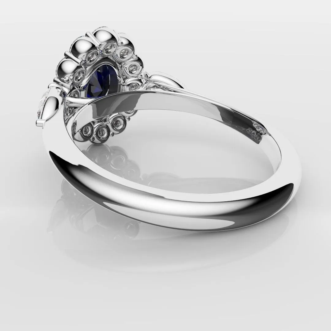 Oval Sapphire Cluster With Pear Shoulder Diamonds