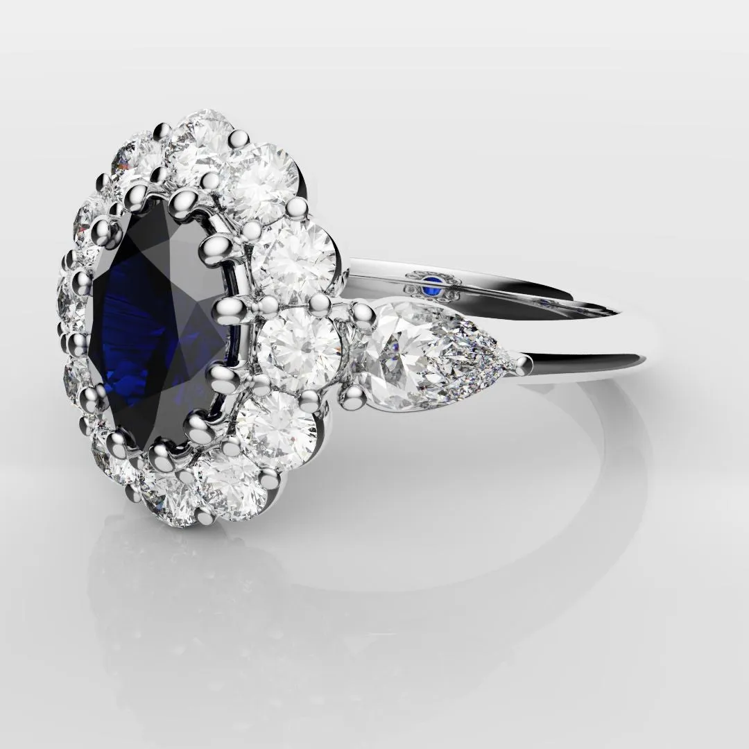 Oval Sapphire Cluster With Pear Shoulder Diamonds