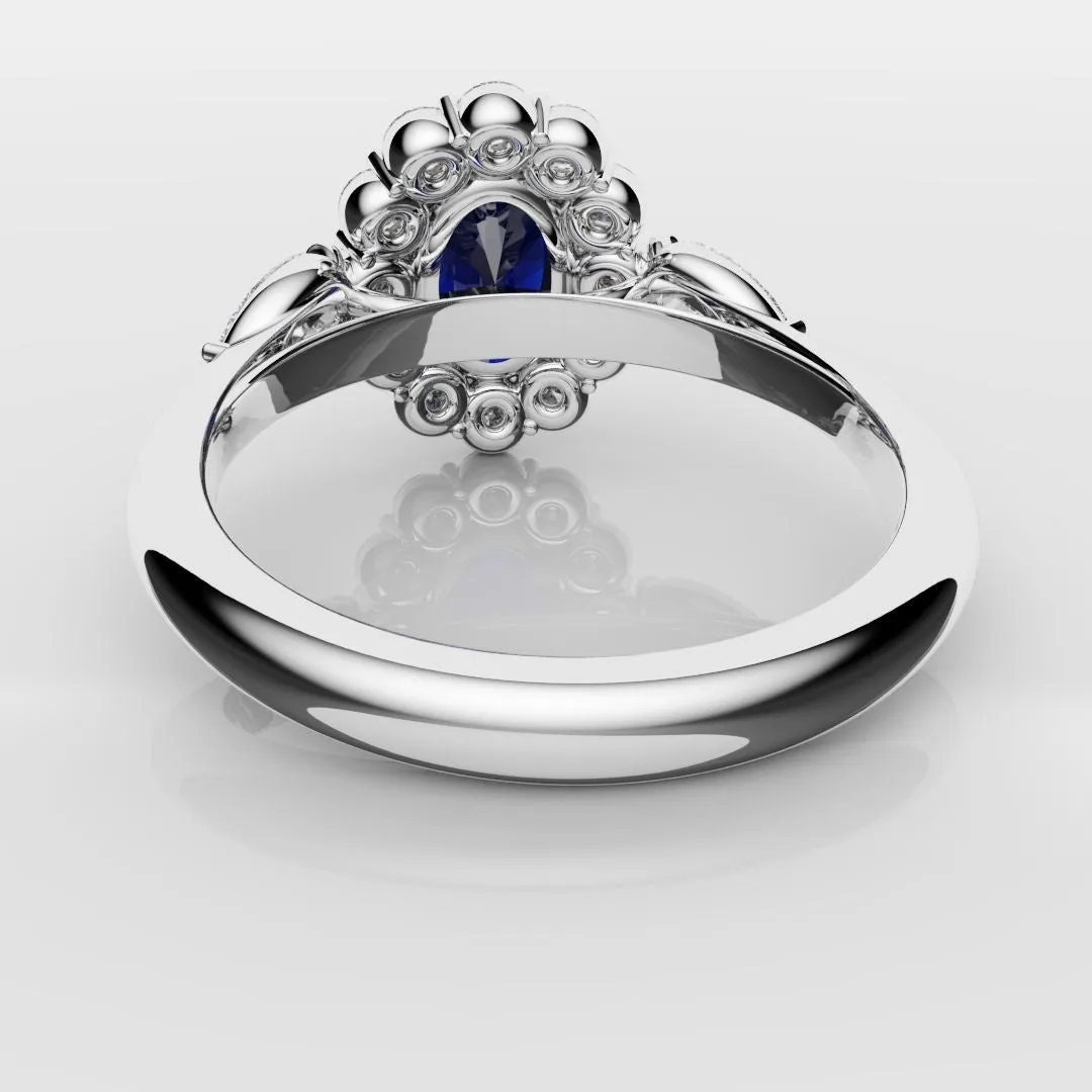 Oval Sapphire Cluster With Pear Shoulder Diamonds