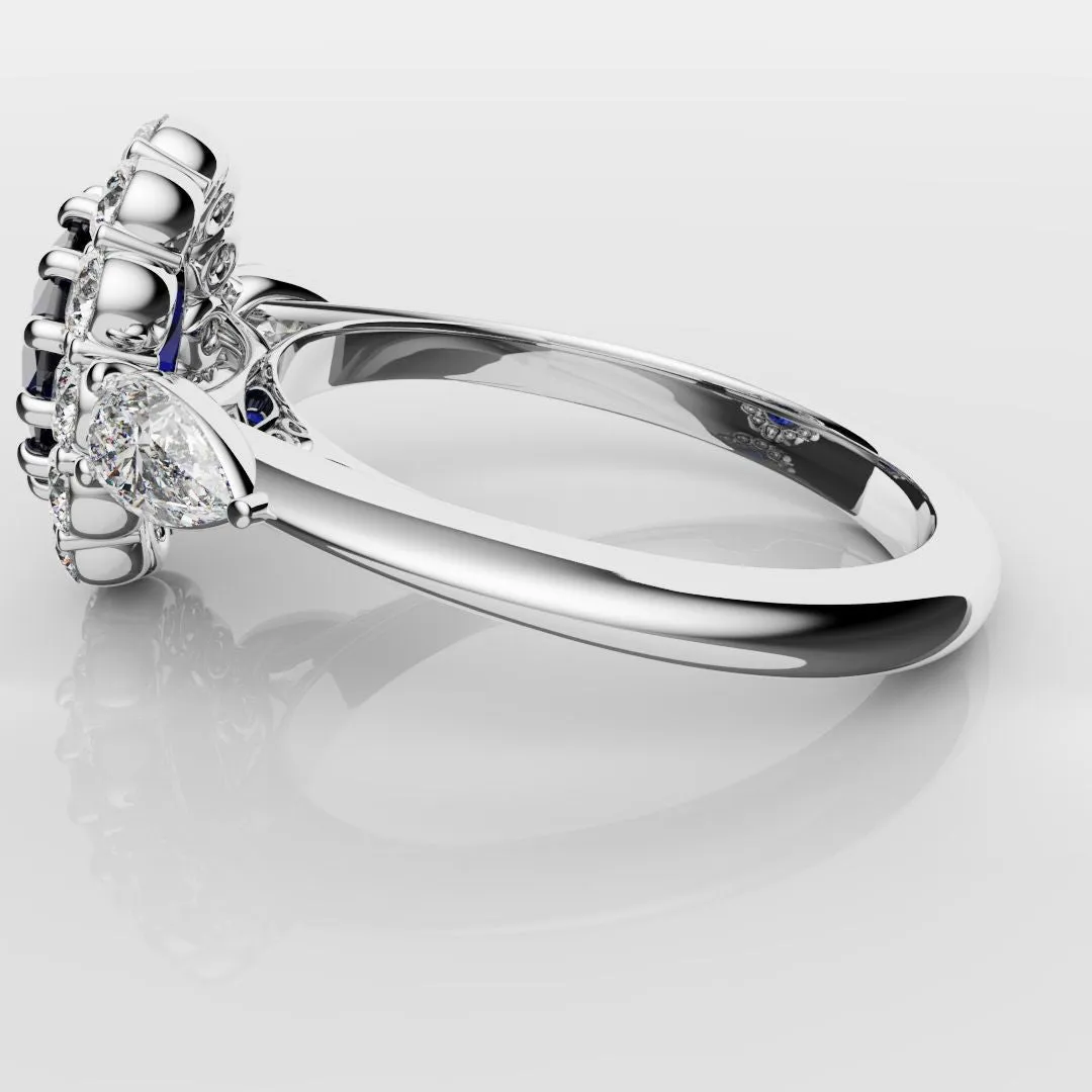 Oval Sapphire Cluster With Pear Shoulder Diamonds