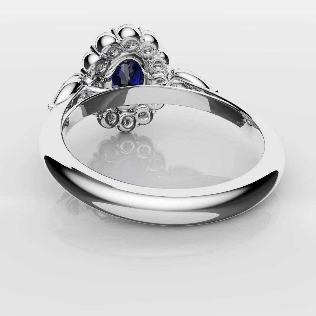 Oval Sapphire Cluster With Pear Shoulder Diamonds