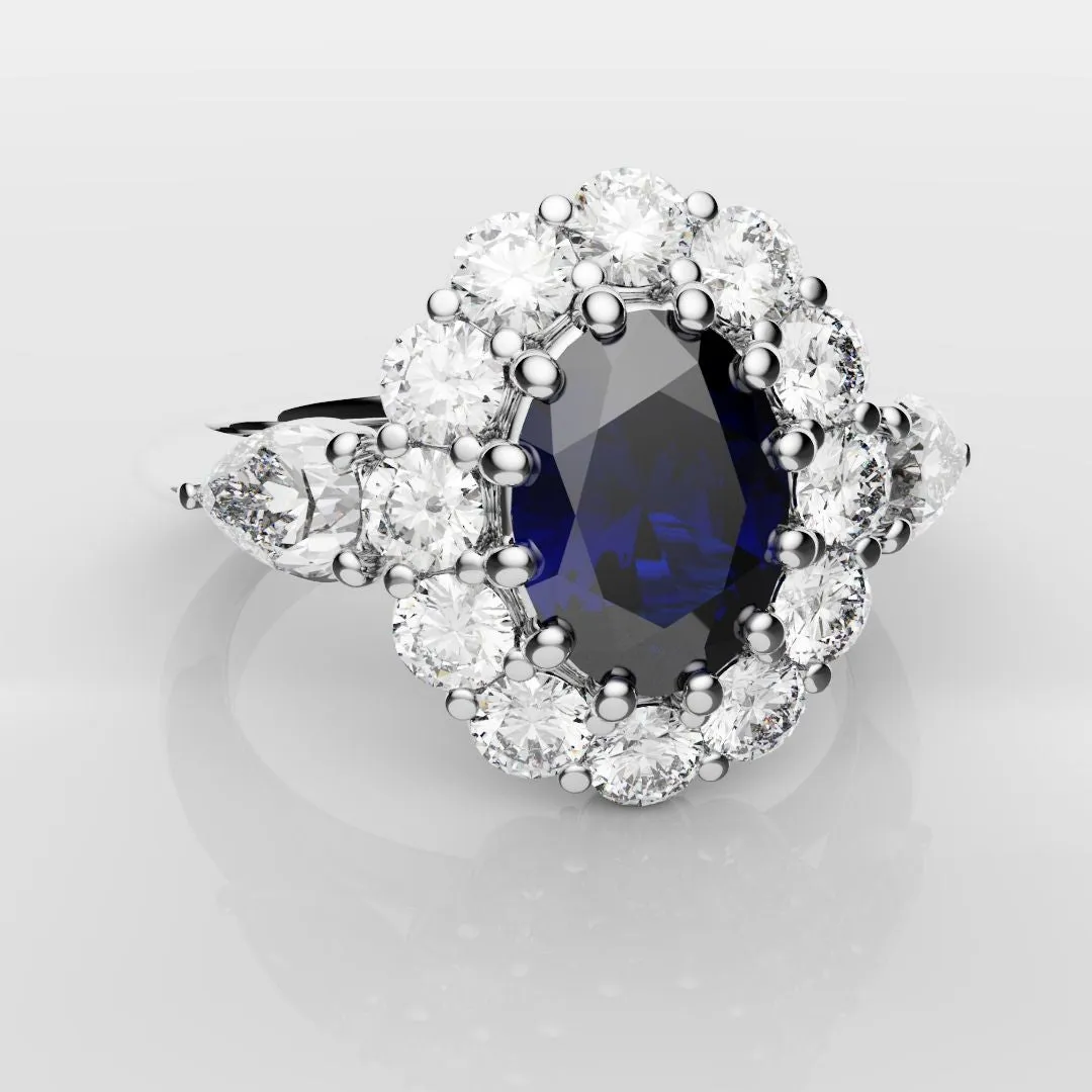 Oval Sapphire Cluster With Pear Shoulder Diamonds