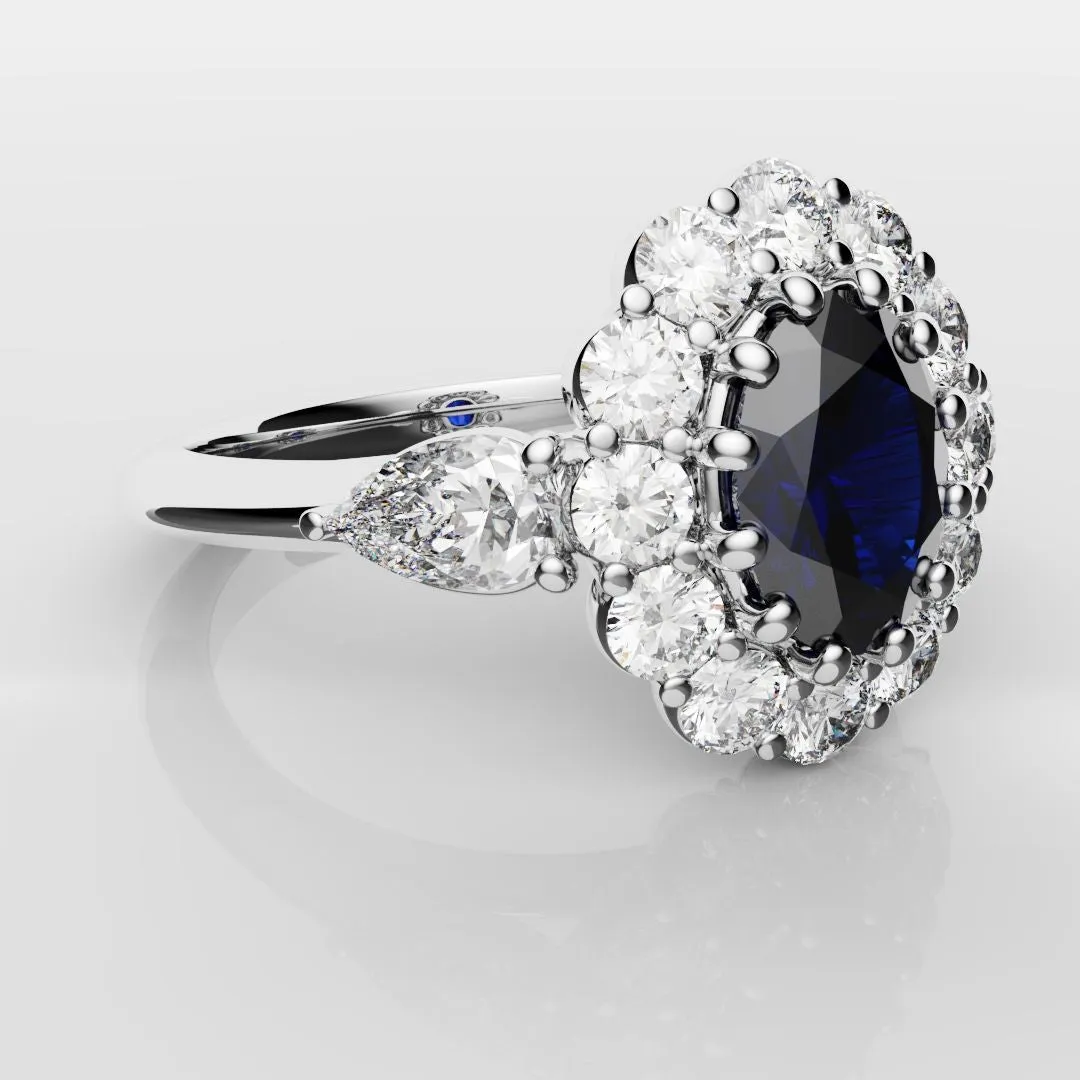 Oval Sapphire Cluster With Pear Shoulder Diamonds