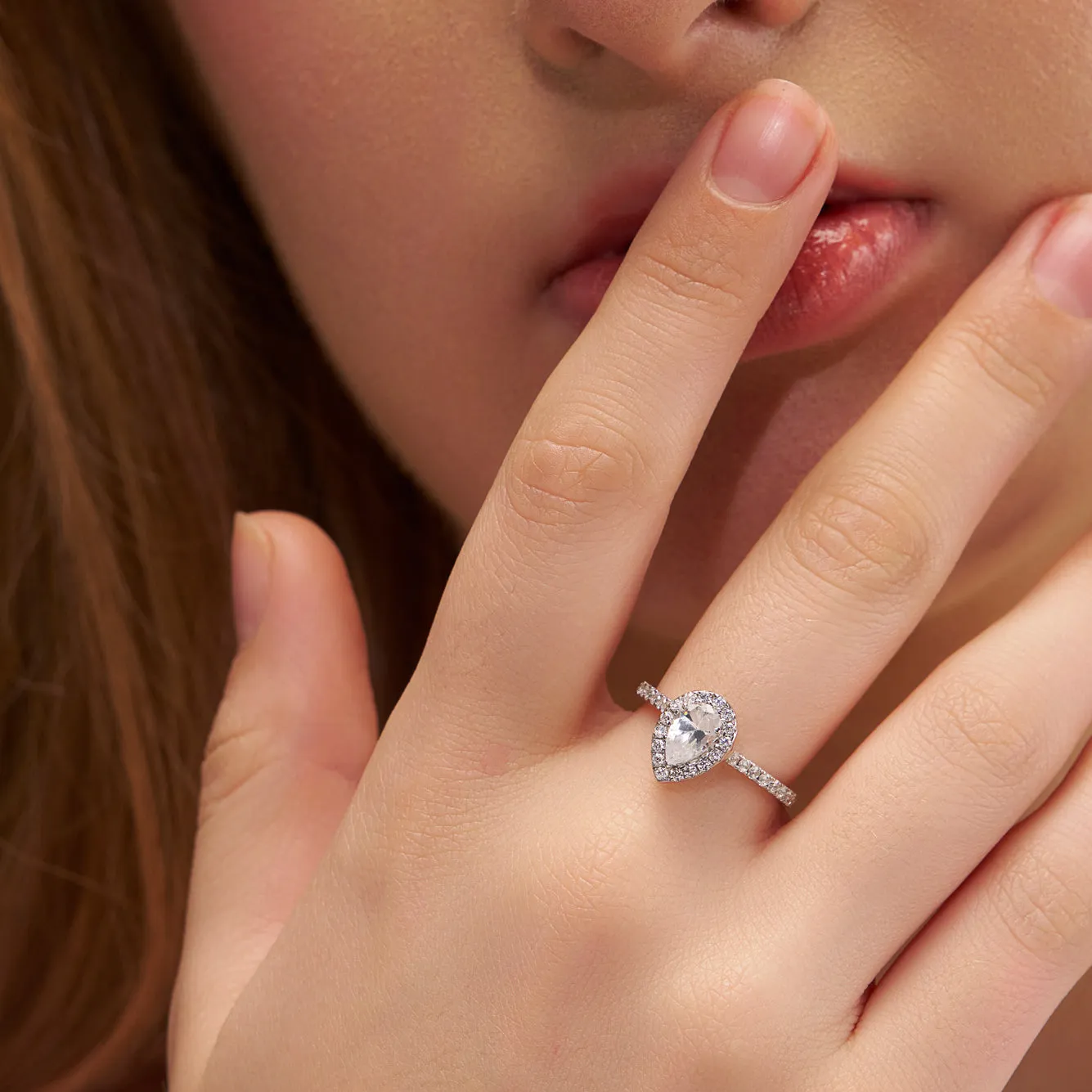 Timeless Elegant Pear Halo Ring